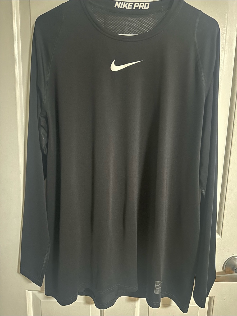 Nike Black Long Sleeve Dri-FIT Performance Shirt with White Swoosh